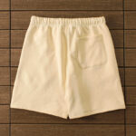 "essence" shorts beige - Image 2